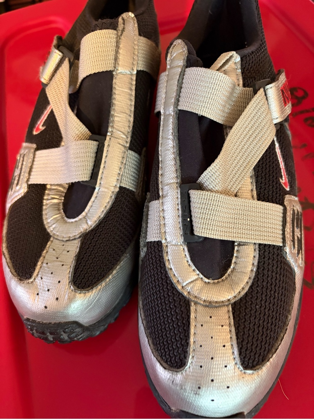 Nike Women’s Silver and Black Athletic Sneakers